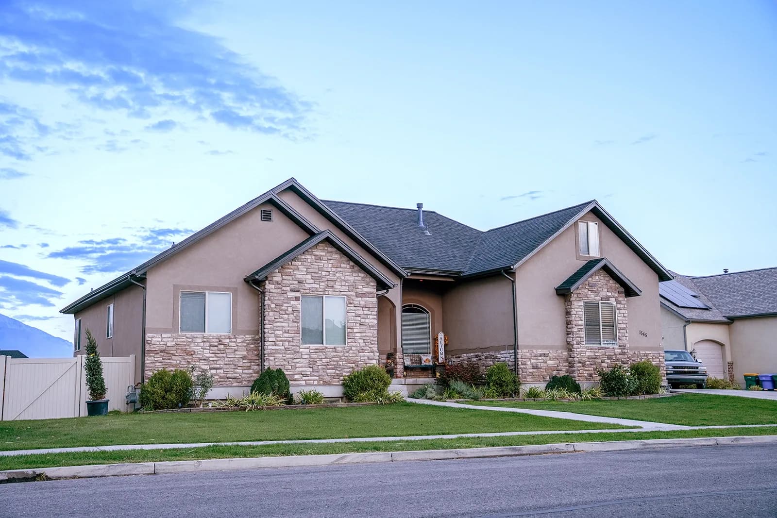 Daytime view of a home where the aluminum LED track blends into the soffit line
