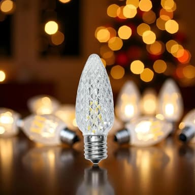 Warm white C9 bulb with holiday bokeh background